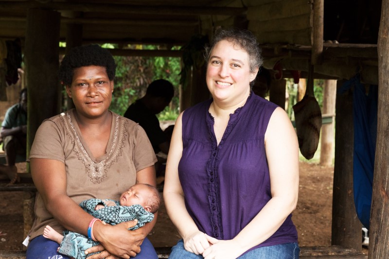 Matilda (left) helped Rick and Anji Zook learn the Lusi culture and language. Now she helps with Bible translation.