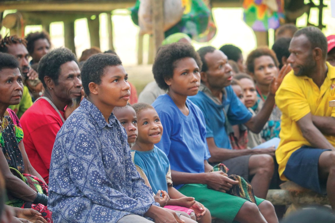 Kaje peoplelistening to teaching