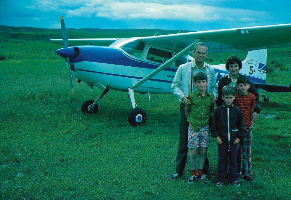 The Sanford family (Steve in front) visiting Tribal Air Communications (now Ethnos360 Aviation) in Grant, Nebraska. Circa 1975