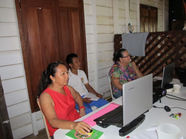 Two ladies working on a language project